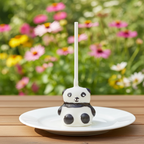 cake pop panda zittend